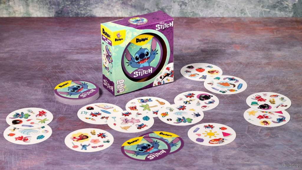 dobble stitch — jeu installé sur une table